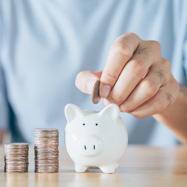 Piggy bank provided by https://www.vecteezy.com/photo/4572732-closeup-of-man-hand-putting-money-coin-into-piggy-bank-for-saving-money-saving-money-and-financial-concept