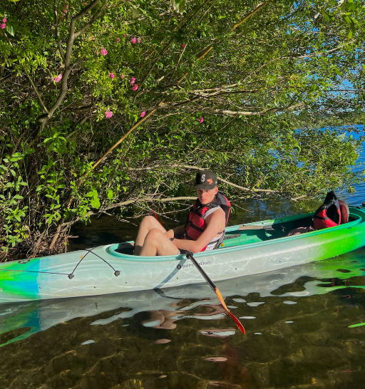 Ayden in kayak.