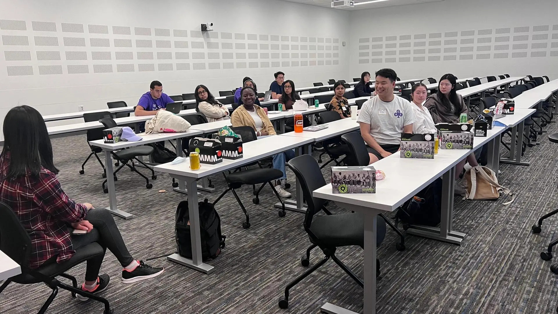 Students and faculty engaged in discussion at ACE Computing Education Symposium
