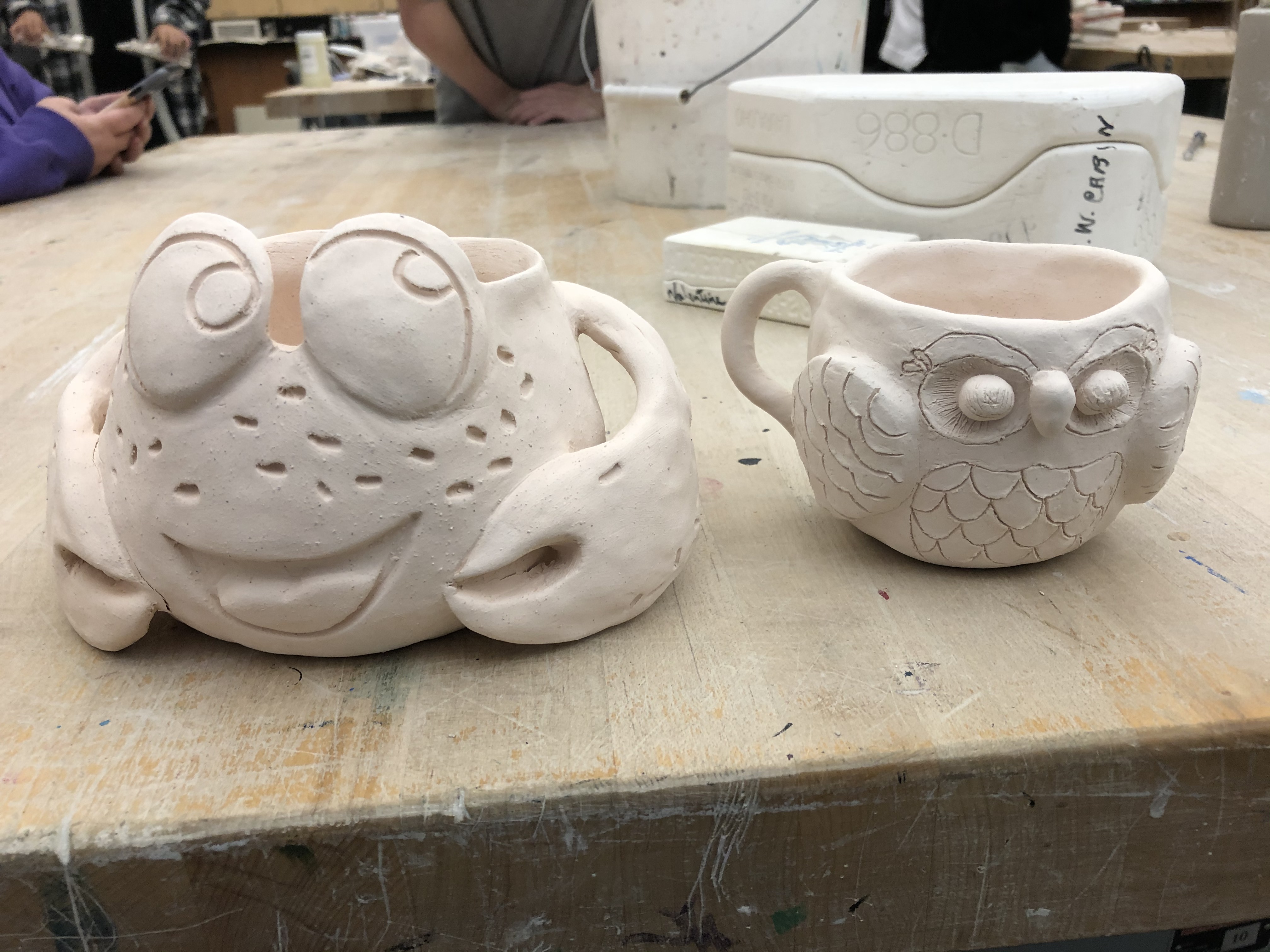 a crab ceramic and a owl cup un-glazed