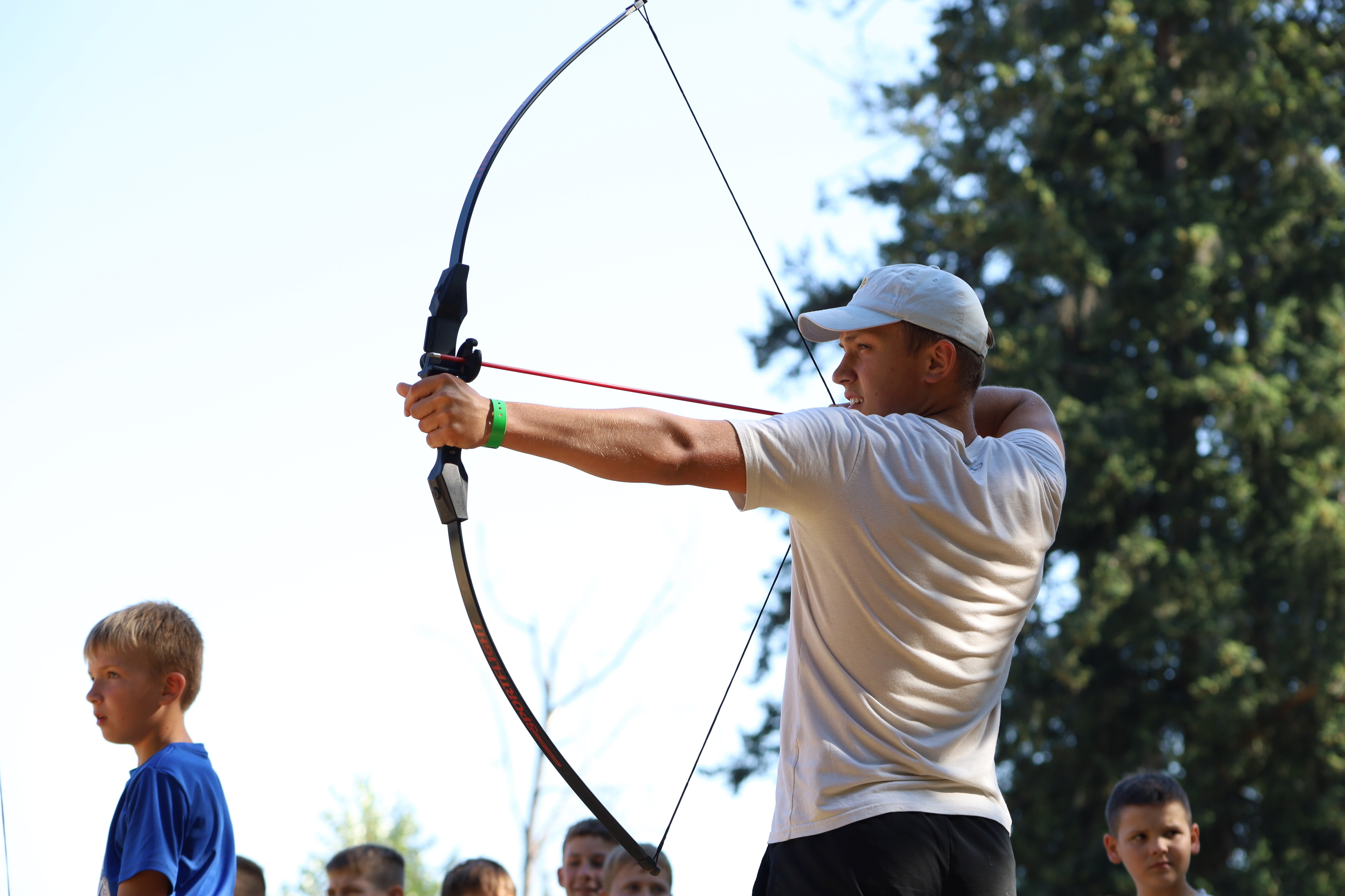 Serhiy shooting a bow